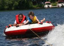 Fresh Air Fund kids enjoying boating
