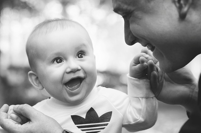 Affective Development - A father and child smiling