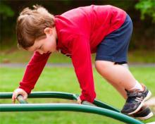 Coordination child applying his knowledge of coordination on the playground