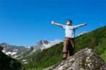 Confidence child on a mountain displaying confidence