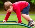 Coordination child applying his knowledge of coordination on the playground